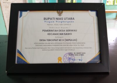 DESA SERIWA’U MENDAPAT PENGHARGAAN 10 BESAR PENETAPAN APBDES TERCEPAT TAHUN 2025 DI KABUPATEN NIAS UTARA